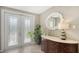 Bright entryway with double doors and decorative console table at 549 Sloop Ln, Longboat Key, FL 34228