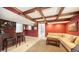 Home bar with seating and a leopard print rug at 549 Sloop Ln, Longboat Key, FL 34228