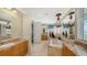 Large bathroom with double sinks, soaking tub, and a separate shower at 549 Sloop Ln, Longboat Key, FL 34228
