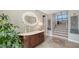 Bright entryway with decorative console table and mirror, leading to staircase at 549 Sloop Ln, Longboat Key, FL 34228