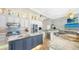 Spacious kitchen with granite countertops, stainless steel appliances, and island seating at 549 Sloop Ln, Longboat Key, FL 34228