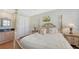 Bedroom with a four-poster bed and built-in closet at 549 Sloop Ln, Longboat Key, FL 34228