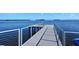 Modern dock with metal railings offering water access at 549 Sloop Ln, Longboat Key, FL 34228