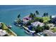 Luxury waterfront home with private dock and lush landscaping at 549 Sloop Ln, Longboat Key, FL 34228