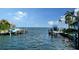 Beautiful waterfront view with boats and private docks at 549 Sloop Ln, Longboat Key, FL 34228