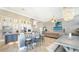 Open concept kitchen with island, breakfast bar and stainless steel appliances at 549 Sloop Ln, Longboat Key, FL 34228