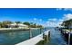 Private dock providing water access with beautiful views at 549 Sloop Ln, Longboat Key, FL 34228