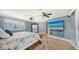 Primary bedroom with king-size bed and ocean-view TV at 549 Sloop Ln, Longboat Key, FL 34228