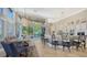 Island kitchen with breakfast bar, white cabinets and granite countertops at 549 Sloop Ln, Longboat Key, FL 34228