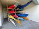 Outdoor rack storing kayaks and paddleboards at 3705 E Bay Dr # 115, Holmes Beach, FL 34217