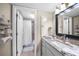 Bathroom features granite countertop, vanity, and shower at 1477 Park Beach Cir # 13, Punta Gorda, FL 33950