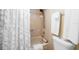 Clean bathroom with shower/tub combo and white towels at 1477 Park Beach Cir # 13, Punta Gorda, FL 33950