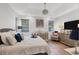 Large main bedroom with wood-look floors and plenty of natural light at 5228 Bentgrass Way, Bradenton, FL 34211