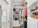 Spacious walk-in closet with ample shelving and hanging space at 5228 Bentgrass Way, Bradenton, FL 34211