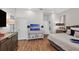 Bright main bedroom with wood-look floors, and access to the main bath at 5228 Bentgrass Way, Bradenton, FL 34211
