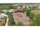 Community playground with playset and swings at 5228 Bentgrass Way, Bradenton, FL 34211