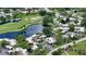 Aerial view showing home's location in community near golf course at 2517 Glebe Farm Close # H-2, Sarasota, FL 34235