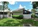Modern home with a screened patio and beautiful landscaping at 2517 Glebe Farm Close # H-2, Sarasota, FL 34235