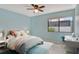 Bright bedroom with a comfortable bed and a workspace at 2517 Glebe Farm Close # H-2, Sarasota, FL 34235