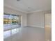 Spacious living room with pool views and sliding glass doors at 12390 Cedar Pass Trl, Parrish, FL 34219