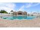 Inviting community pool area with clubhouse in background at 5735 Broad River Run, Ellenton, FL 34222