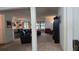 Open living room with a view of the kitchen and dining area at 7410 64Th E St, Palmetto, FL 34221