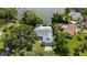 Aerial view showing house and lakefront location at 700 Dolphin Rd, Venice, FL 34293