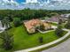 Aerial view of a landscaped home on a cul-de-sac with mature trees and a well maintained lawn at 14526 17Th E Ave, Bradenton, FL 34212