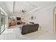 Living room with fireplace, TV, and sliding door entrance at 14526 17Th E Ave, Bradenton, FL 34212