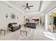 Living room with two couches and entrance to the kitchen at 14526 17Th E Ave, Bradenton, FL 34212