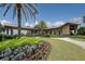 Exterior view of the clubhouse with landscaping at 7298 Belleisle Gln, Lakewood Ranch, FL 34202