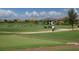 Driving range with golfers and practice area at 7298 Belleisle Gln, Lakewood Ranch, FL 34202