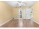 Light and airy bedroom with wood-look floors and access to bathroom at 2903 60Th W St, Bradenton, FL 34209