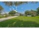 Single-story home with a paved driveway at 13609 3Rd E Ave, Bradenton, FL 34212