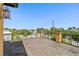 Balcony with neighborhood and water views at 1502 Siesta Dr, Sarasota, FL 34239