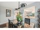 Dining room with glass table, modern light, and kitchen view at 1401 S Mccall Rd # 108A, Englewood, FL 34223