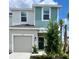 Two-story townhome with two-toned exterior and landscaping at 3071 Novara Ln, Lakewood Ranch, FL 34211