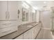 Double vanity bathroom with modern finishes and a large shower at 7301 Ballantrae Pl # 27D, Sarasota, FL 34238