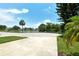Circular driveway with ample parking and lush landscaping at 7301 Ballantrae Pl # 27D, Sarasota, FL 34238