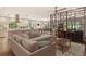 Open concept living area with room divider and stylish furniture at 7301 Ballantrae Pl # 27D, Sarasota, FL 34238