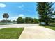 Spacious circular driveway offering convenient access and serene waterway views at 7301 Ballantrae Pl # 27D, Sarasota, FL 34238