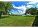 Backyard with pond and preserve views at 7301 Ballantrae Pl # 27D, Sarasota, FL 34238