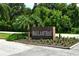 Ballantrae private community entrance sign with landscaping at 7301 Ballantrae Pl # 27D, Sarasota, FL 34238