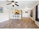 Kitchen with light wood cabinets and breakfast bar at 4805 Rilma Ave # 104, Sarasota, FL 34234