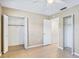 Bedroom with two closets and access to a second bathroom at 4800 Rilma Ave # 143, Sarasota, FL 34234