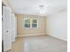 Spacious bedroom with ceiling fan and large closet at 4800 Rilma Ave # 143, Sarasota, FL 34234