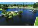 Aerial view showing a peaceful waterfront community at 139 Long Meadow Lane Ln, Rotonda West, FL 33947