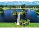 Aerial view of waterfront community with docks and gazebo at 139 Long Meadow Lane Ln, Rotonda West, FL 33947