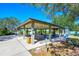 Covered picnic pavilion with tables and benches at 139 Long Meadow Lane Ln, Rotonda West, FL 33947