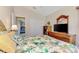 Guest bedroom with double bed and built in shelving at 139 Long Meadow Lane Ln, Rotonda West, FL 33947